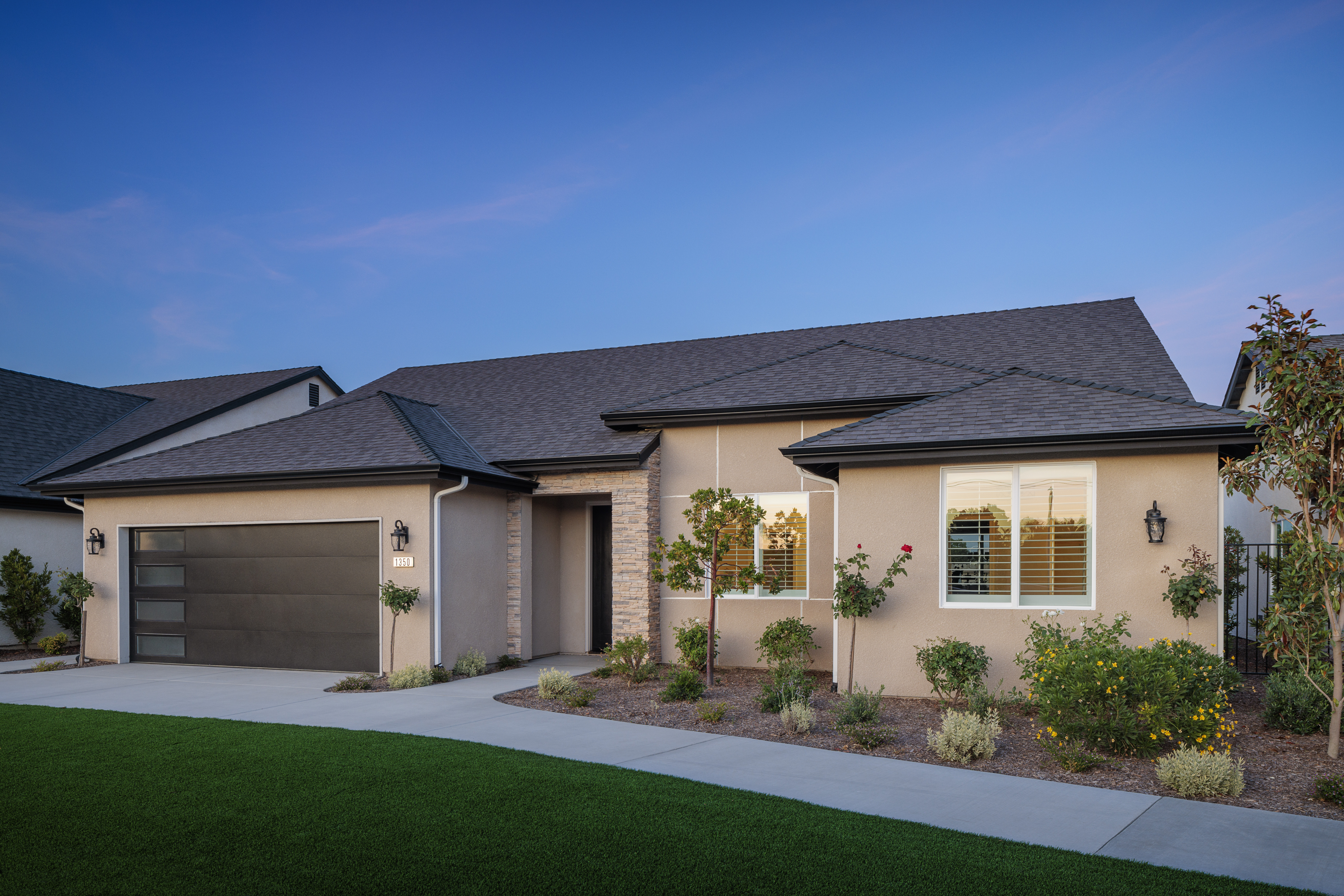 Laurelwood — Carmel plan exterior at twilight